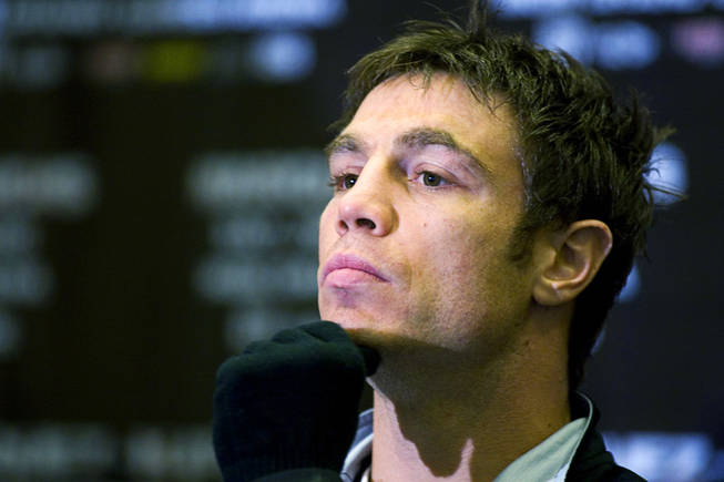 Lightweight boxer Michael Katsidis of Australia listens to speakers during a pre-fight press conference in the lobby of the MGM Grand Resort in Las Vegas